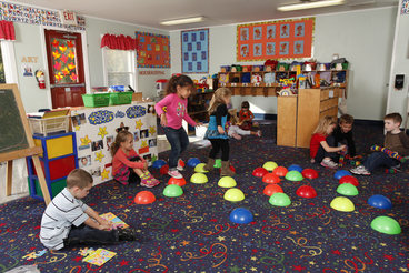 Children playing in classroom